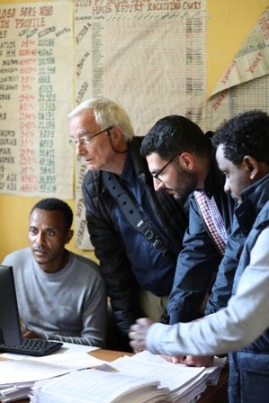 Roy Anderson with a Ministry of Health data recorder at a health centre in Sodo, Ethiopia. Image courtesy World Vision Ethiopia