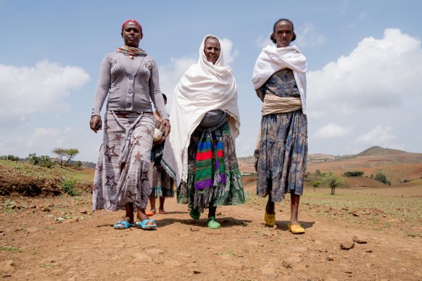 Wlubnesh Fentaye Adane, 50, leaves the health post with CBM-supported health extension worker Asefu Ayalew in Faya, Amhara Region, Ethiopia. CBM/Hayduk